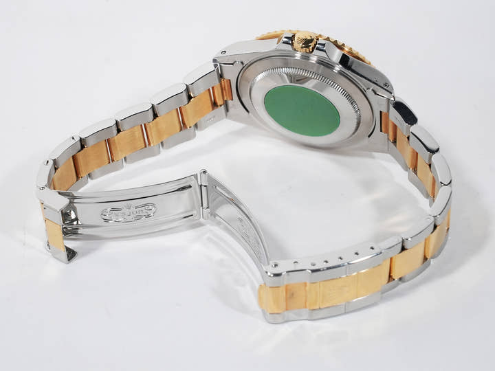 Rolex GMT-Master II Ref.16713 Stainless Steel/Yellow Gold Brown Dial Oyster Bracelet Pre-owned f7nb8x4d
