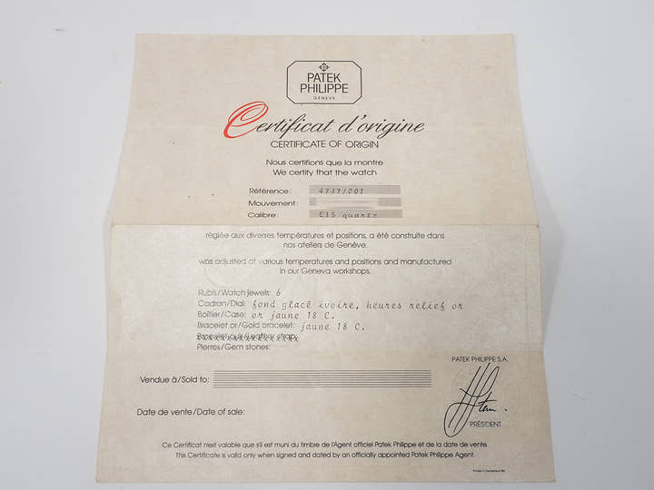 パテックフィリップ カラトラバ Ref.4747/001 イエローゴールド アイボリー文字盤