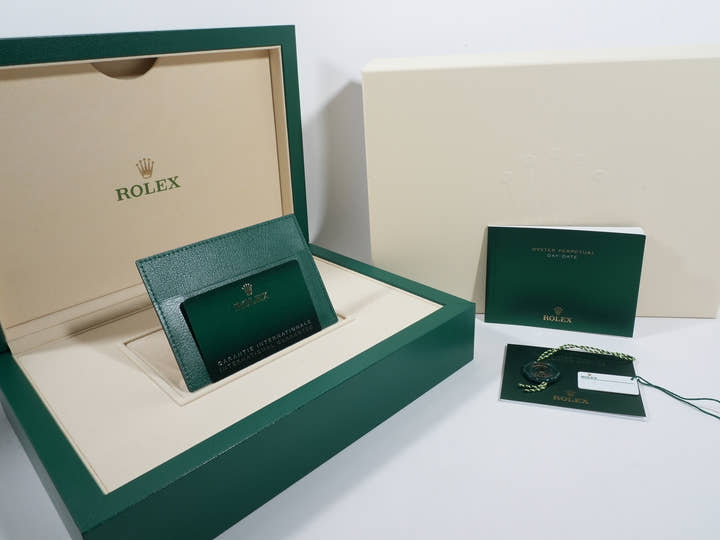 Rolex Day-Date 36 Ref. 128459TBR White Gold Polar Jade Dial with 10 Ruby Markers