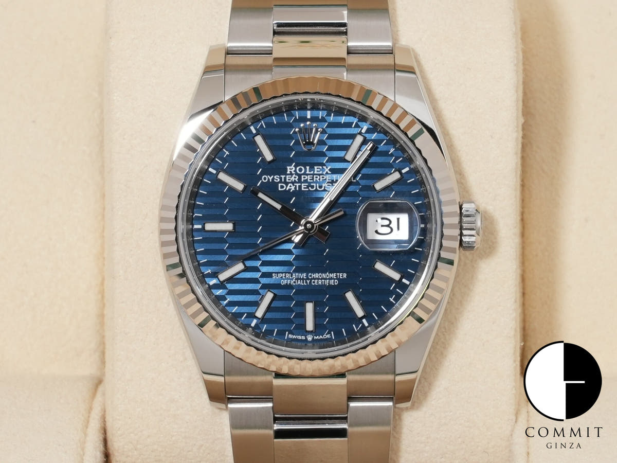 Rolex Datejust 36 Ref. 126234 Stainless Steel/White Gold Bright Blue Fluted Motif Dial