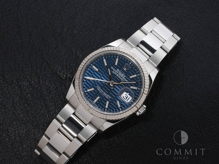 Rolex Datejust 36 Ref. 126234 Stainless Steel/White Gold Bright Blue Fluted Motif Dial
