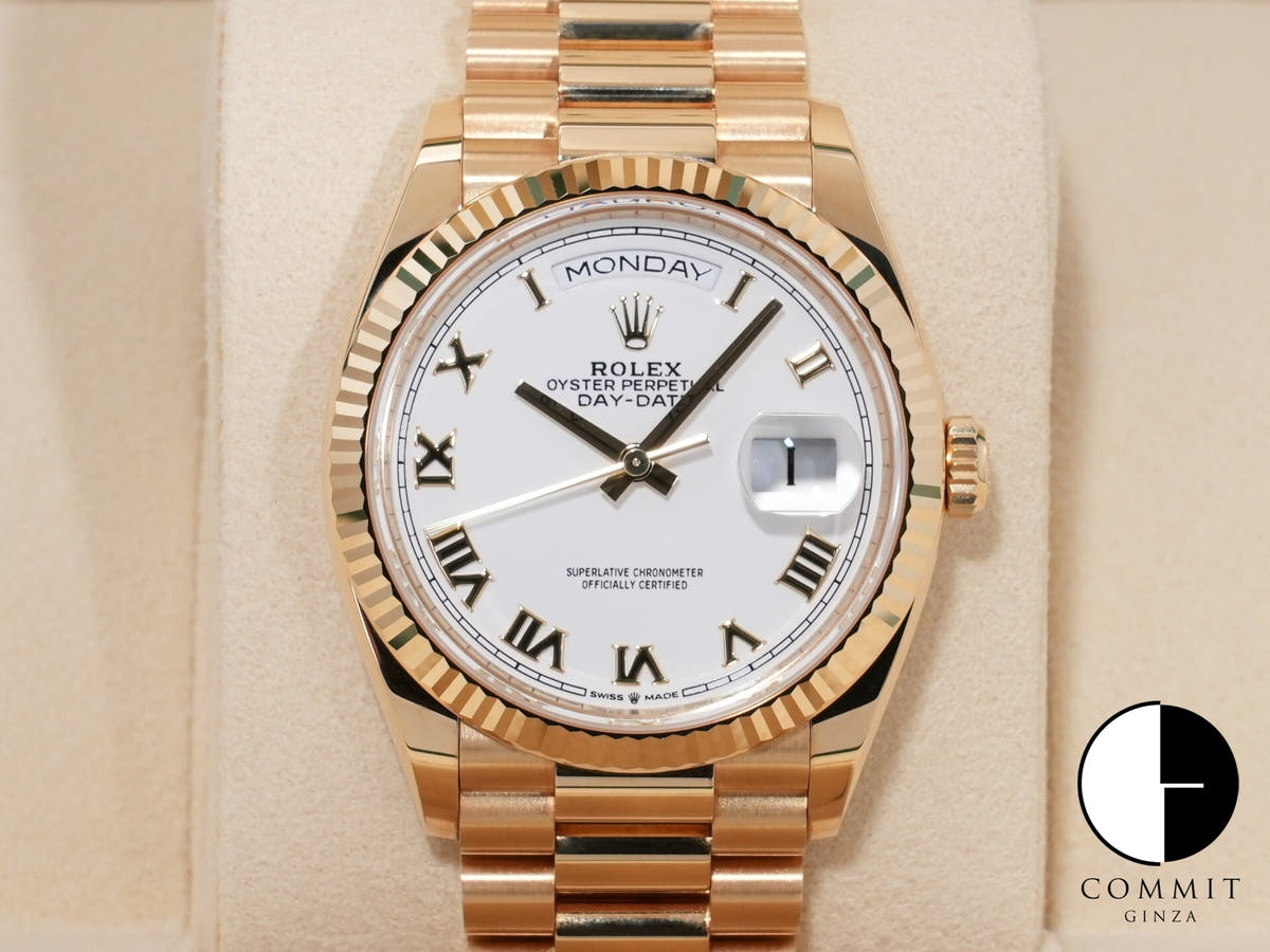 Rolex Day-Date 36 Ref. 128238 Yellow Gold White Roman Dial Pre-owned 9prykerz