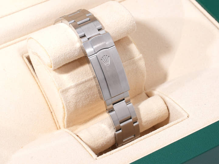 Rolex Oyster Perpetual 31 Ref. 277200 Stainless Steel Coral Red Dial