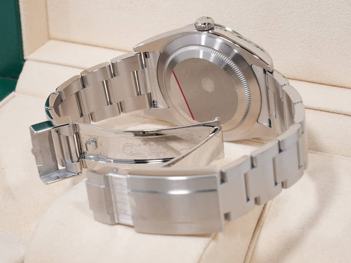 Rolex Explorer I Ref. 214270, stainless steel, black dial, Oyster bracelet, excellent condition.  (23fkzga9 appears to be an internal reference number and not part of the product description)