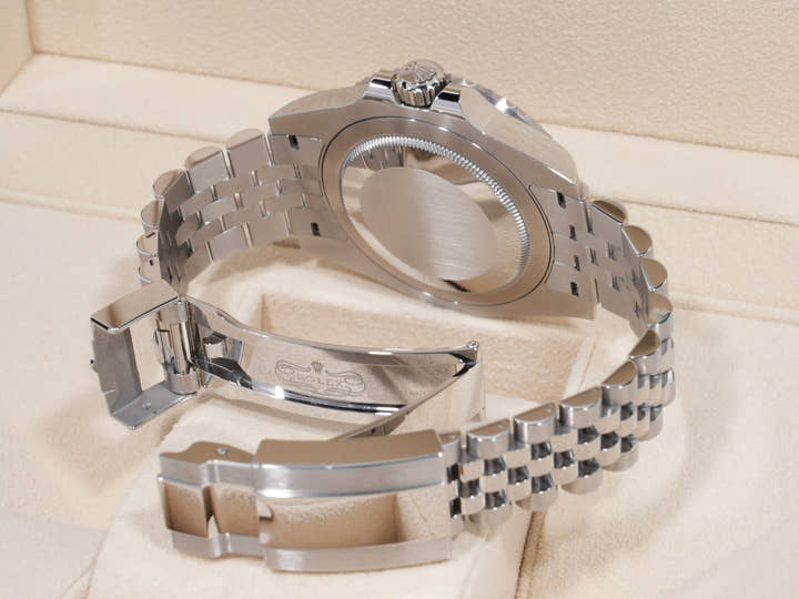 Rolex GMT-Master II Ref. 126710BLNR, stainless steel, black dial, Jubilee bracelet, pre-owned (used but in good condition).