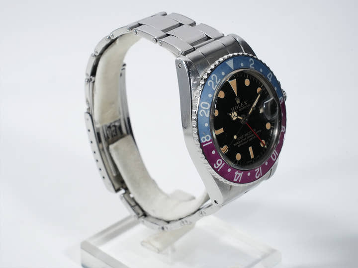 Rolex GMT Master Ref. 1675, stainless steel, black dial, Oyster bracelet, pre-owned. (inr48cp2 appears to be an internal reference number and not part of the product description)