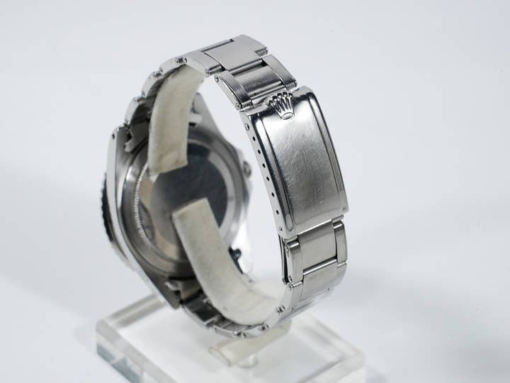 Rolex GMT Master Ref. 1675, stainless steel, black dial, Oyster bracelet, pre-owned. (inr48cp2 appears to be an internal reference number and not part of the product description)