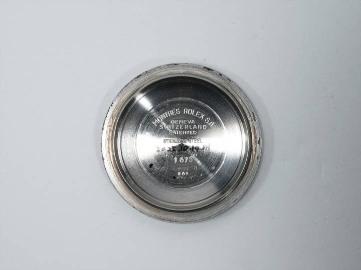 Rolex GMT Master Ref. 1675, stainless steel, black dial, Oyster bracelet, pre-owned. (inr48cp2 appears to be an internal reference number and not part of the product description)