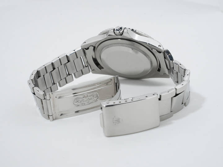 Pre-owned Rolex GMT-Master Ref. 1675 Stainless Steel with Black Dial and Oyster Bracelet (kwnjg8zj)