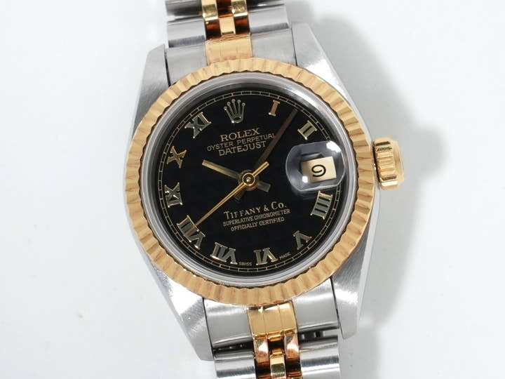 Pre-owned Rolex Datejust TIFFANY & CO. Ref. 69173 in Stainless Steel/Yellow Gold with Black Pyramid Roman Dial and Jubilee Bracelet (goeq3n8r)