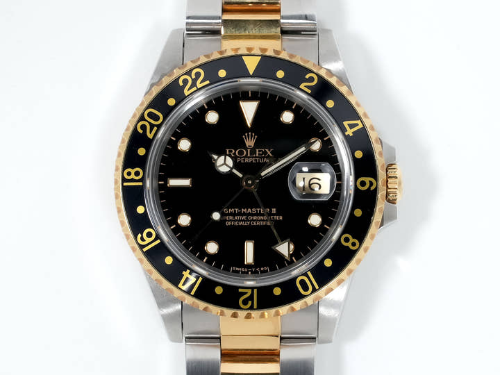 Pre-owned Rolex GMT-Master II Ref. 16713 in stainless steel/yellow gold with a black dial and Oyster bracelet (ygieugp7)