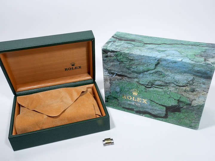 Pre-owned Rolex GMT-Master II Ref. 16713 in stainless steel/yellow gold with a black dial and Oyster bracelet (ygieugp7)