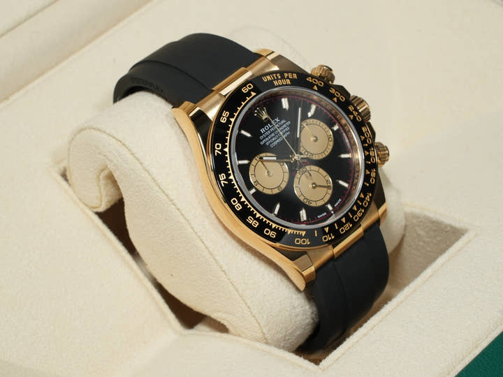 Rolex Daytona Ref. 126518LN Yellow Gold Black and Champagne Dial Unused 4g9r39i9