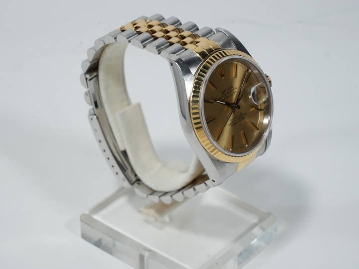 Pre-owned Rolex Datejust 36 with TIFFANY double name, Ref. 16233, stainless steel/yellow gold, champagne dial, ezoq67dh