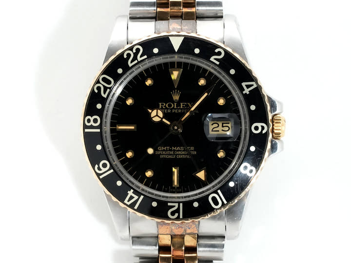 Pre-owned Rolex GMT-Master Ref. 16753 in stainless steel/yellow gold with a black dial and Jubilee bracelet (xkrpyj86)