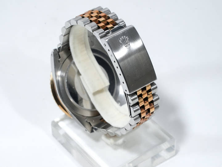 Pre-owned Rolex GMT-Master Ref. 16753 in stainless steel/yellow gold with a black dial and Jubilee bracelet (xkrpyj86)