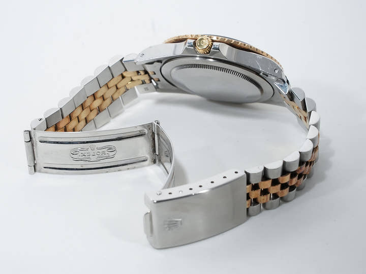 Pre-owned Rolex GMT-Master Ref. 16753 in stainless steel/yellow gold with a black dial and Jubilee bracelet (xkrpyj86)