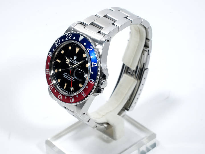 Pre-owned Rolex GMT-Master Ref. 16750 Stainless Steel with Black Dial and Oyster Bracelet (fvn4itmv)