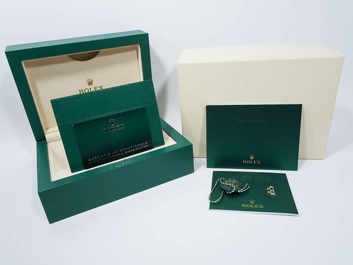 Pre-owned Rolex GMT-Master II Ref. 126713GRNR in stainless steel/yellow gold with a black dial and Jubilee bracelet (9ahj2noe)