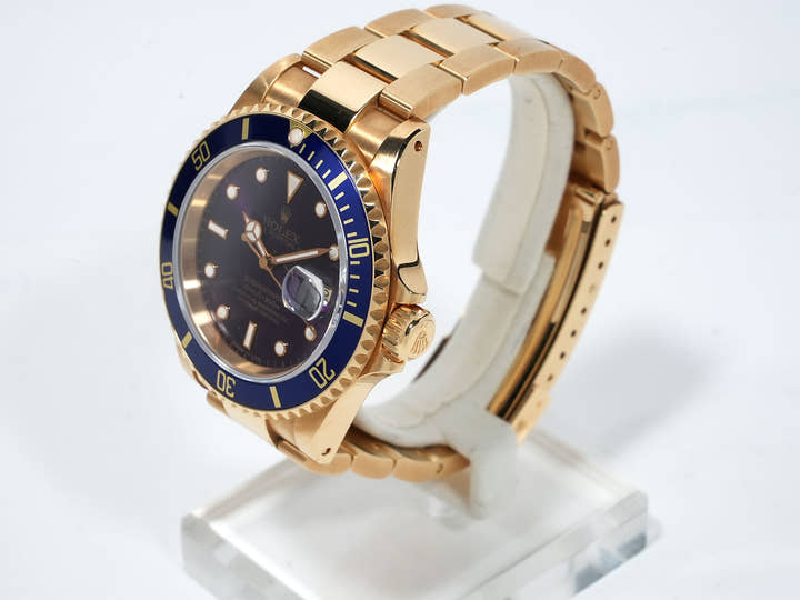 Pre-owned Rolex Submariner Date Ref. 16618 in Yellow Gold with Blue Dial (ybhedk48)