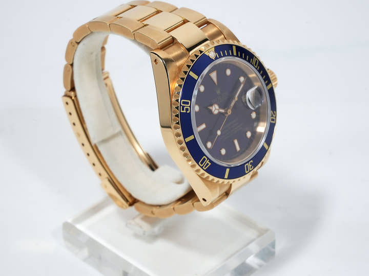 Pre-owned Rolex Submariner Date Ref. 16618 in Yellow Gold with Blue Dial (ybhedk48)