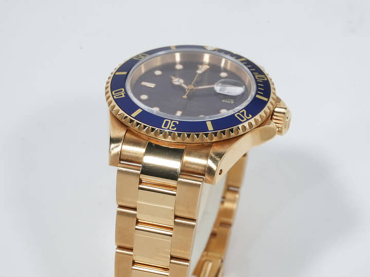 Pre-owned Rolex Submariner Date Ref. 16618 in Yellow Gold with Blue Dial (ybhedk48)