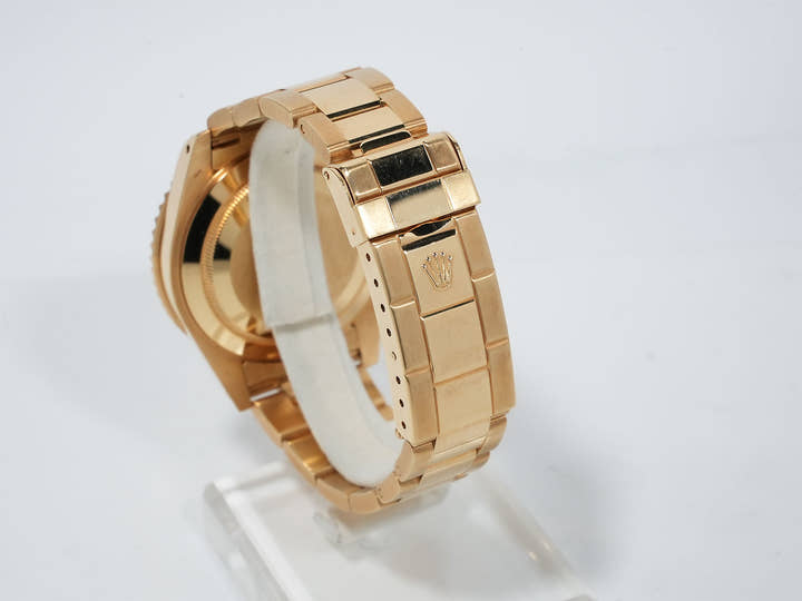 Pre-owned Rolex Submariner Date Ref. 16618 in Yellow Gold with Blue Dial (ybhedk48)