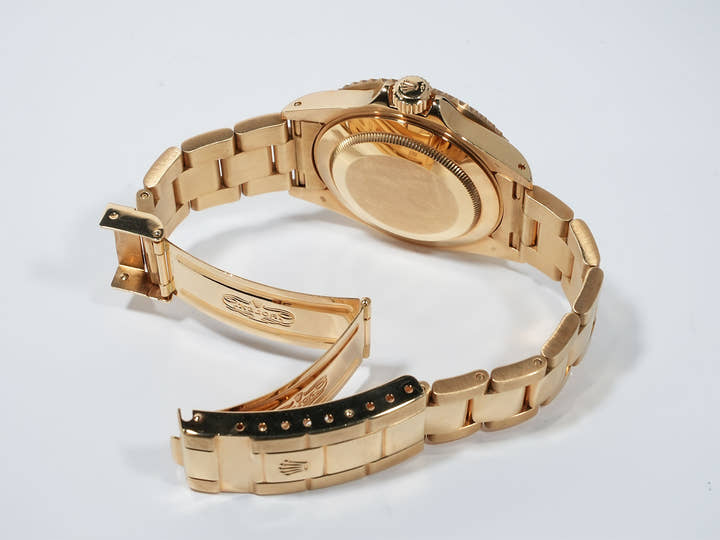 Pre-owned Rolex Submariner Date Ref. 16618 in Yellow Gold with Blue Dial (ybhedk48)