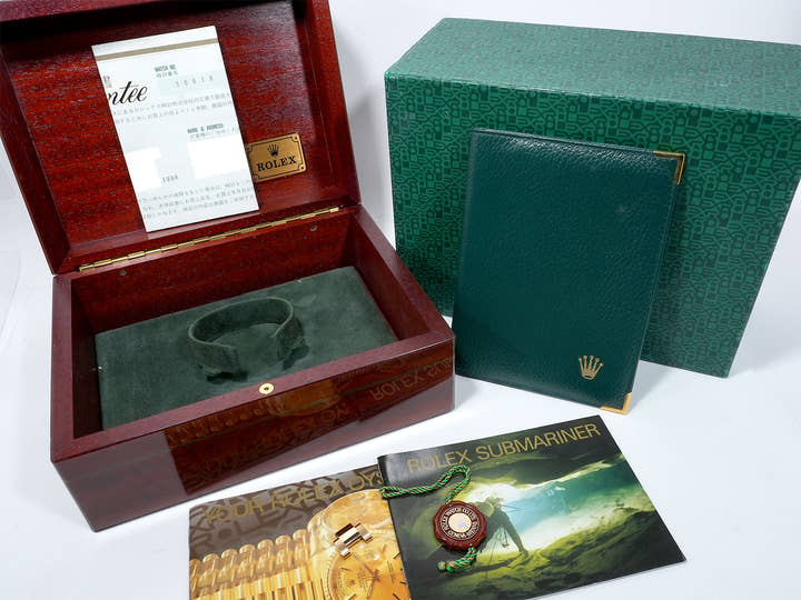 Pre-owned Rolex Submariner Date Ref. 16618 in Yellow Gold with Blue Dial (ybhedk48)