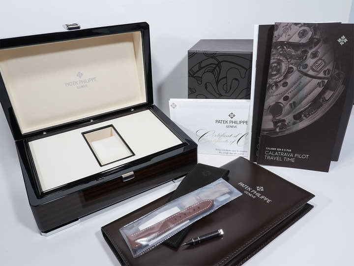 Patek Philippe Calatrava Pilot Travel Time Ref. 7234G-001 White Gold Blue Dial Excellent Used Condition ndfbsbq3