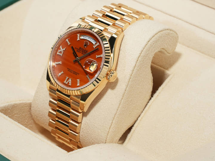 ロレックス デイデイト36 Ref.128238 イエローゴールド カーネリアン文字盤 中古 junm9xpu