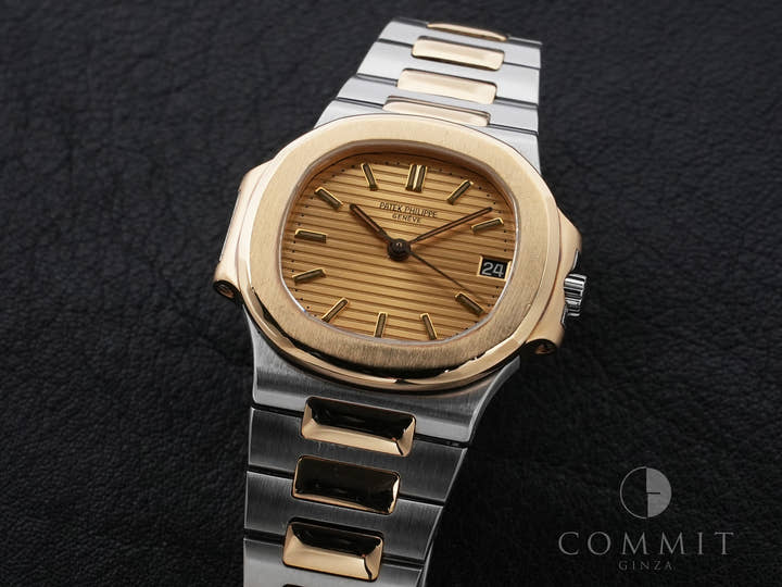 Patek Philippe Nautilus Ref. 3800/1JA Stainless Steel/Yellow Gold Champagne Dial Used c57cxbmq