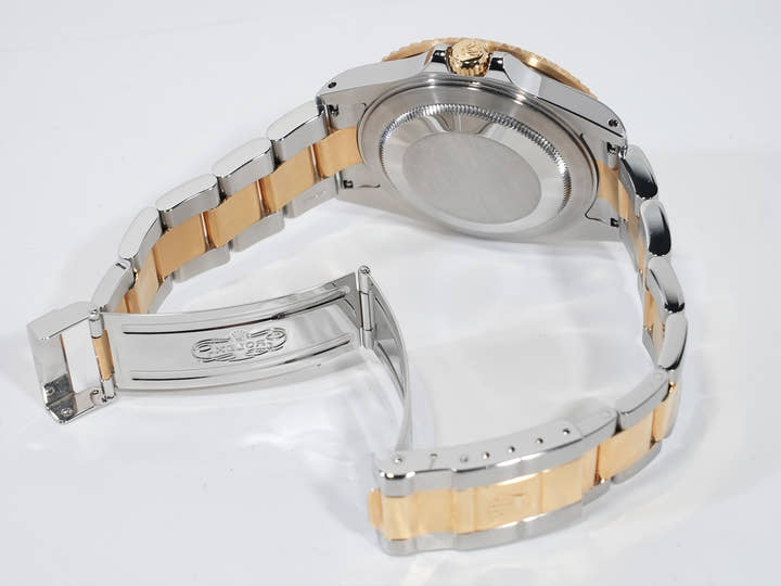 Rolex GMT-Master II Ref.16713RG Stainless Steel/Yellow Gold Champagne Dial Oyster Bracelet Used iafxtkn2