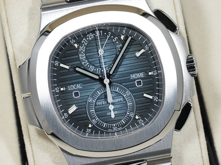 Patek Philippe Nautilus Travel Time Chronograph Ref.5990/1A-011 Stainless Steel Blue Sunburst Dial Unused gv2f58qq