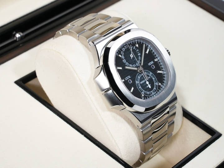 Patek Philippe Nautilus Travel Time Chronograph Ref.5990/1A-011 Stainless Steel Blue Sunburst Dial Unused gv2f58qq
