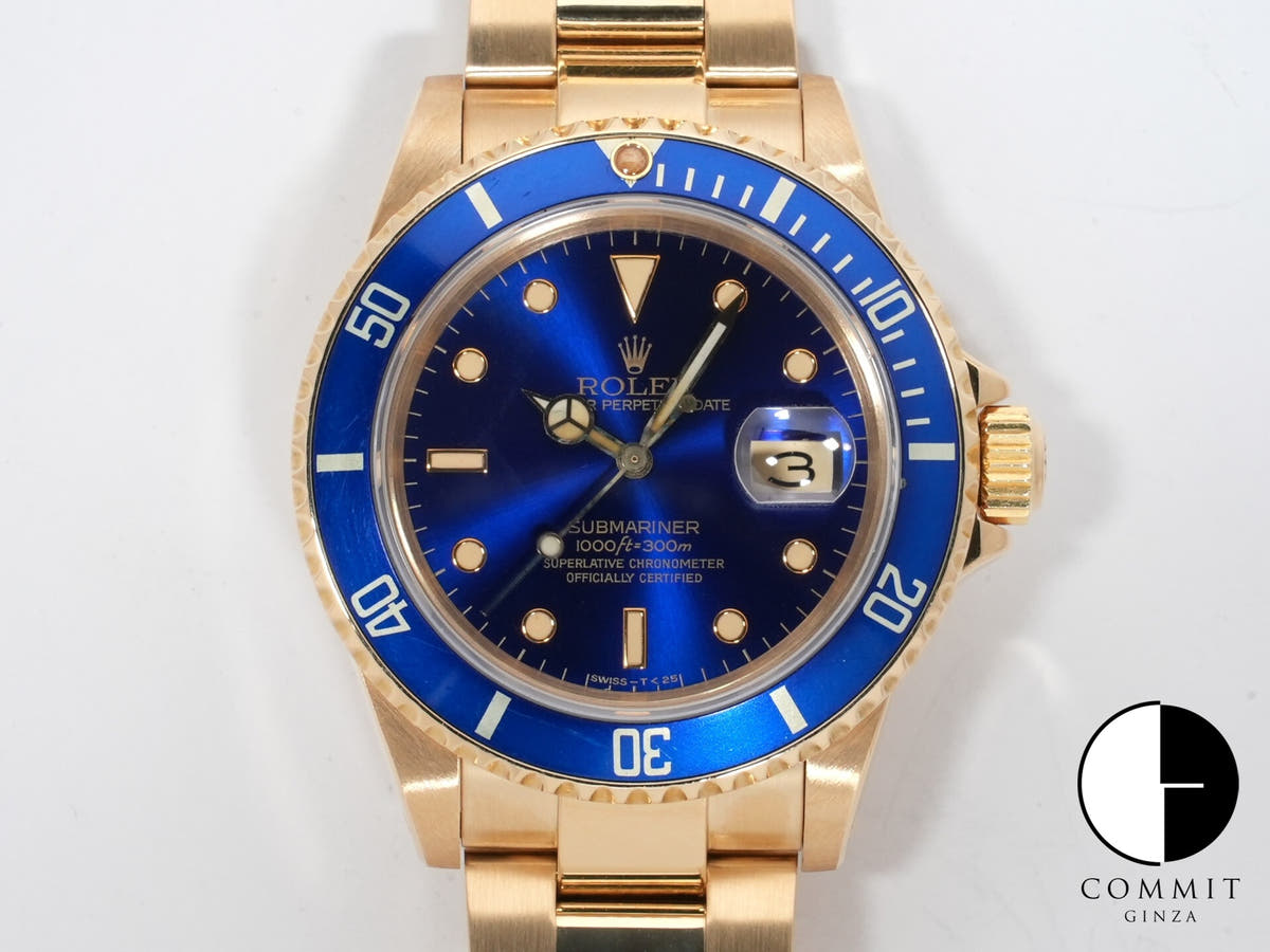 Rolex Submariner Date Ref. 16808 Yellow Gold Blue Dial Pre-owned swcopyzn