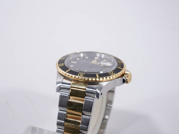 ロレックス サブマリーナー デイト Ref.16803 ステンレススチール/イエローゴールド ブラック文字盤 中古 aizv85pt