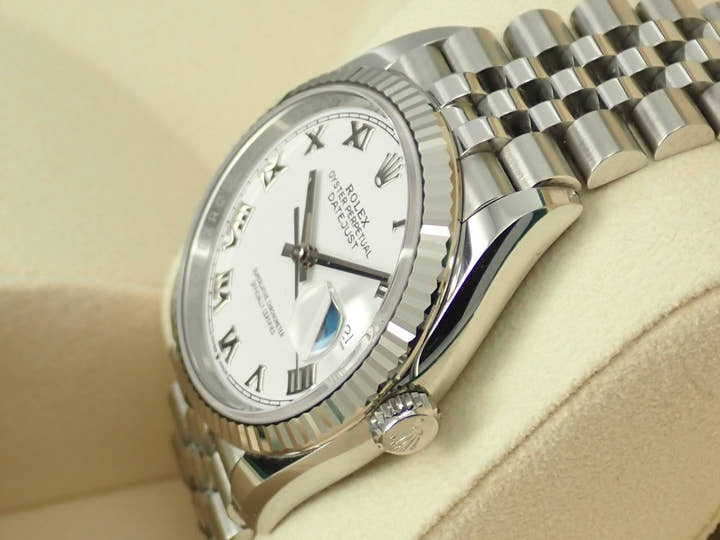 Pre-owned Rolex Datejust 36 Ref. 126234, stainless steel/white gold, white Roman numeral dial, Jubilee bracelet. (40YPLCFC likely refers to an internal reference number or code)