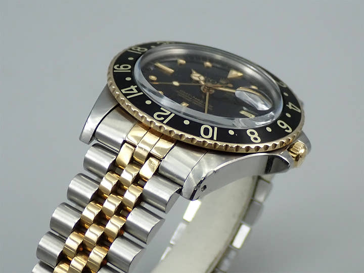 ロレックス GMTマスター Ref.16753 ステンレススチール/イエローゴールド ブラック文字盤 ジュビリーブレスレット 中古 Y60S2708