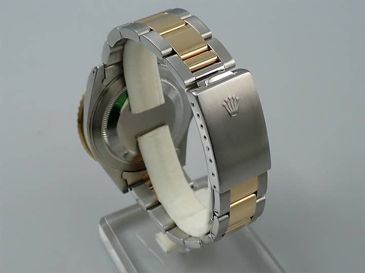 Rolex GMT-Master II Ref. 16713 Stainless Steel/Yellow Gold Brown Dial Oyster Bracelet