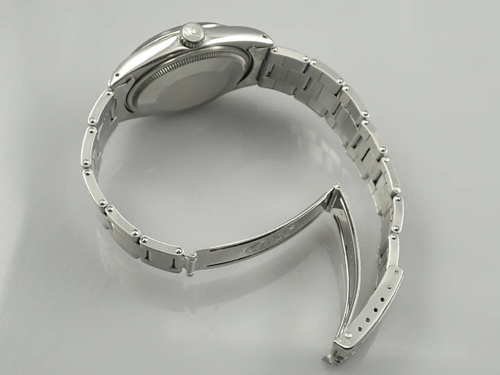 Rolex Oyster Perpetual Date Ref. 1500 Stainless Steel Black (Tropical) Dial Pre-owned 19SS3721