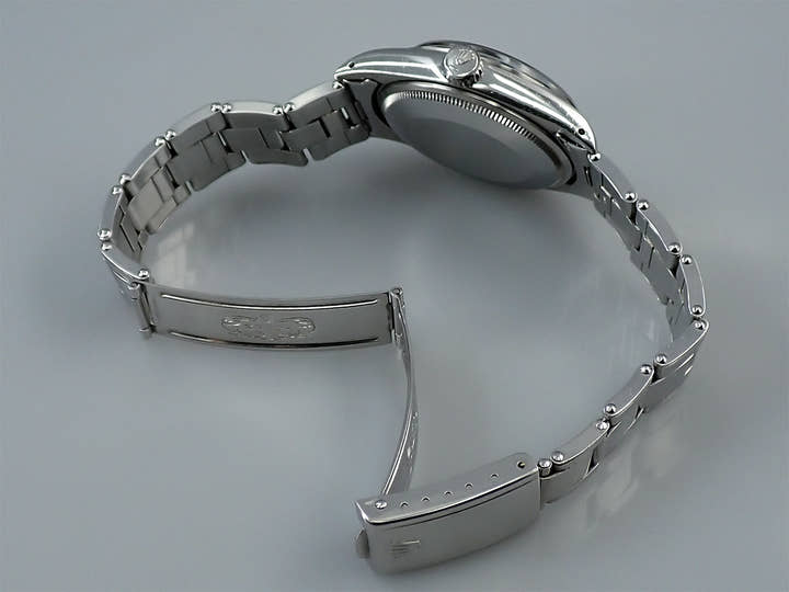 ロレックス オイスターパーペチュアル デイト Ref.1500 ステンレススチール トロピカルミラー文字盤 中古 8295LP4S