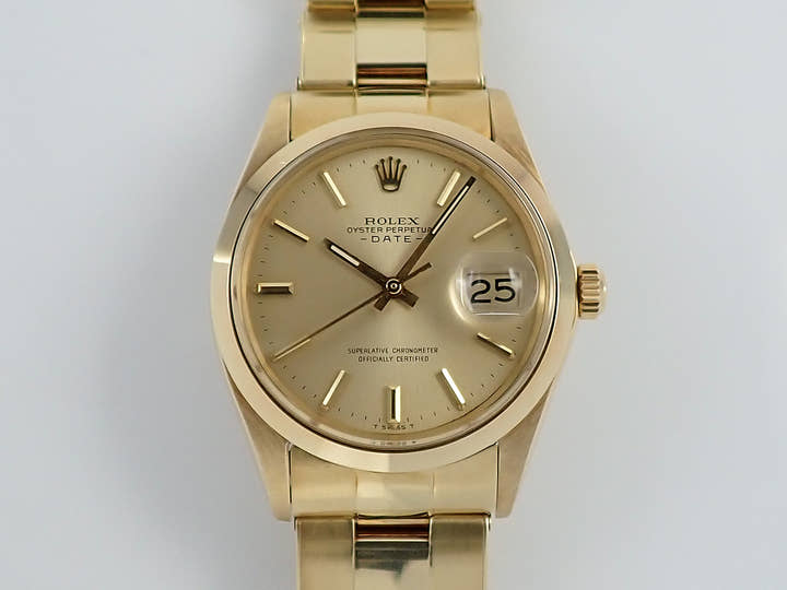 ロレックス オイスターパーペチュアル デイト Ref.1500 イエローゴールド シャンパン文字盤