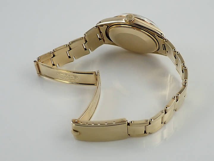 ロレックス オイスターパーペチュアル デイト Ref.1500 イエローゴールド シャンパン文字盤