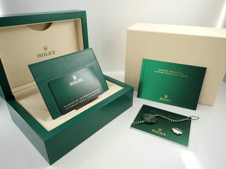 Rolex Oyster Perpetual 41 Ref. 124300 Stainless Steel Green Dial