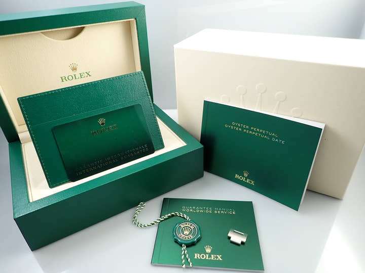 Rolex Oyster Perpetual 41 Ref. 124300 Stainless Steel Bright Black Dial