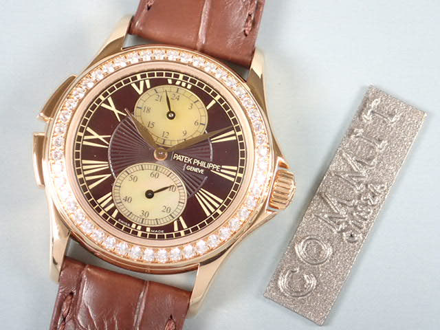 パテックフィリップ トラベルタイム Ref.4934R-001 ブラウン文字盤 中古 travel-time