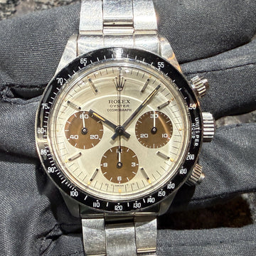 No. 2274 - A rare, hand-wound Daytona has arrived! It features a full complement of accessories and a beautiful tropical dial! Introducing the Rolex 6263 Silver '75 All Tritium!