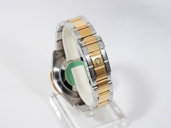 Rolex GMT-Master II Ref.16713 Stainless Steel/Yellow Gold Brown Dial Oyster Bracelet Pre-owned f7nb8x4d