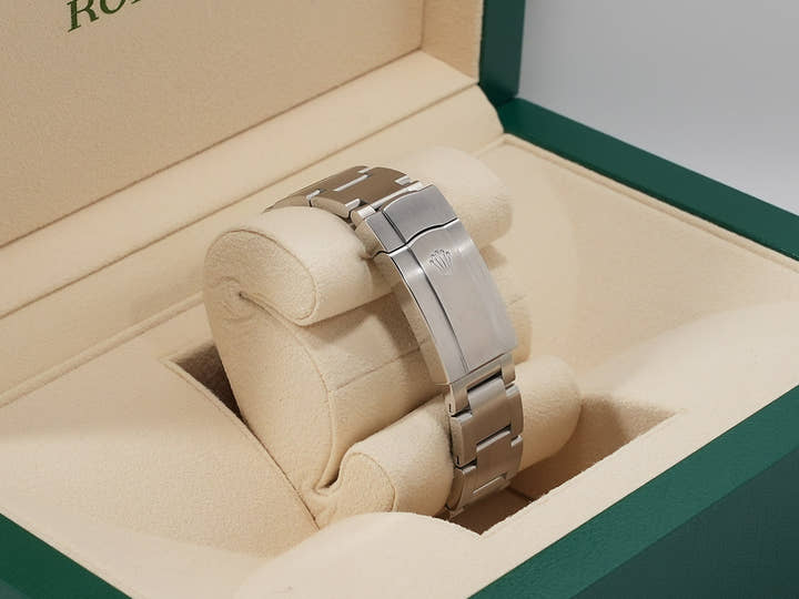 Rolex Oyster Perpetual 36 Ref. 126000 Stainless Steel Coral Red Dial